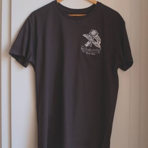 Photo of a t-shirt embroidered with teh Tchai-Ovna logo
